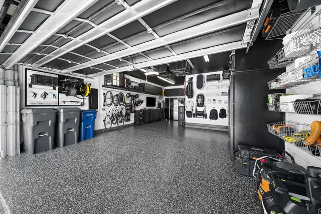 The full room viewed from the open garage.