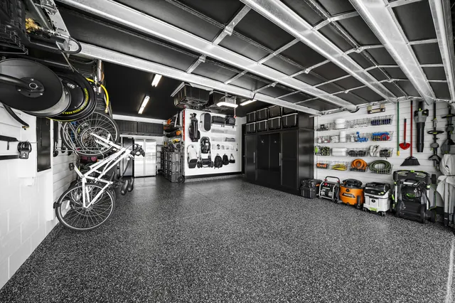 Wall and overhead storage preserve working floor space.