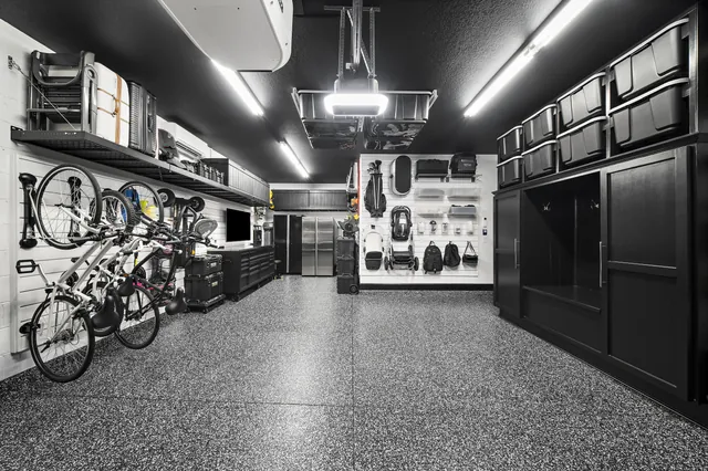 Workshop and household storage have distinct places within one room, so home projects and family routines can coexist.