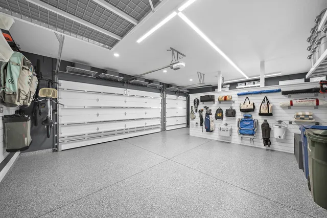 Linear lighting and coordinated finishes connect the storage areas.