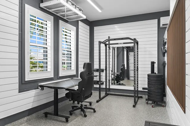 A desk on lockable casters supports a zone that can change from work to fitness.