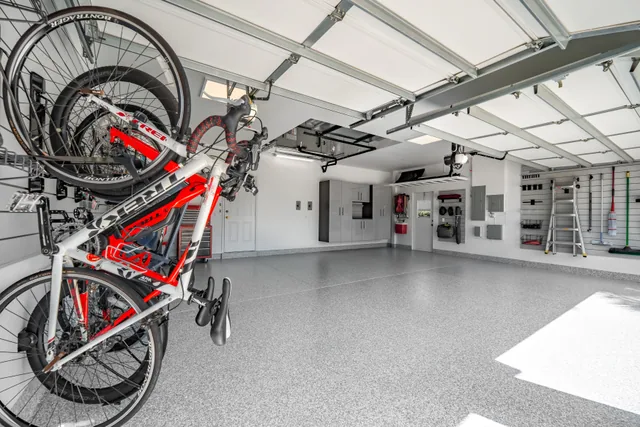 Bike storage beside the open floor and the room’s other installed systems.