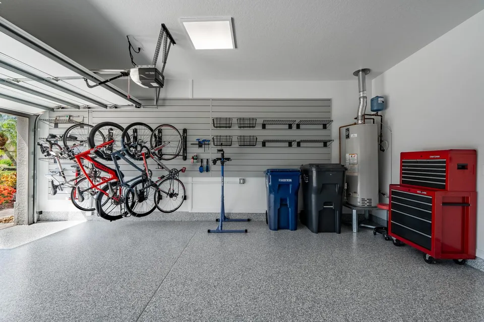 Wall-mounted bikes with open floor area for retrieval in The Seasonal Reset.